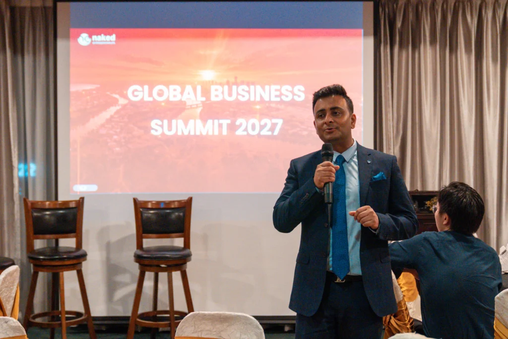 Speaker presenting Global Business Summit 2027